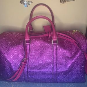 Used authentic pink ombré purple Louis Vuitton duffel bag